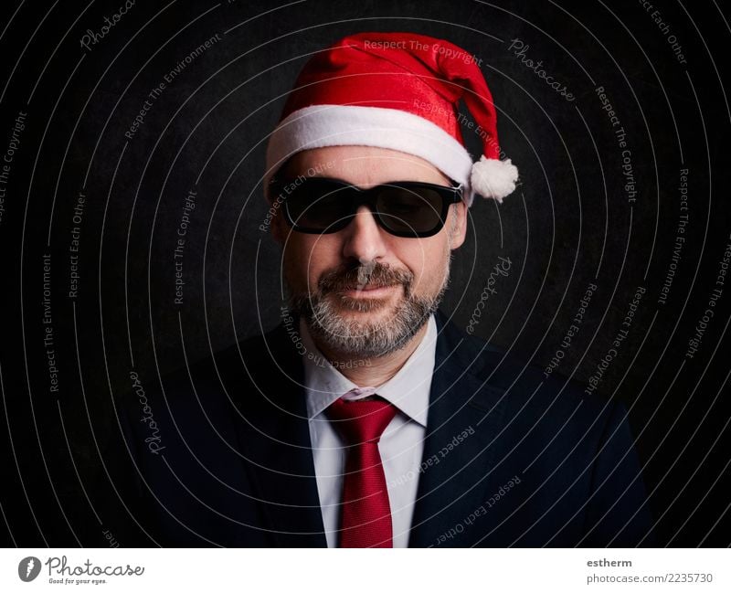 businessman at christmas on black background Lifestyle Elegant Joy Entertainment Party Event Feasts & Celebrations Christmas & Advent New Year's Eve Human being