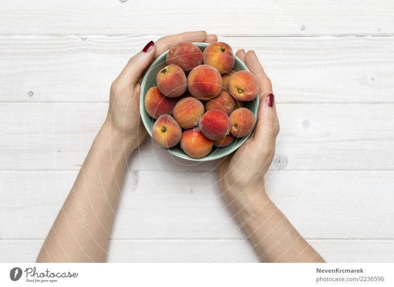 Female hands holding a bowl of peaches Food Fruit Peach Nutrition Eating Breakfast Lunch Dinner Picnic Organic produce Vegetarian diet Diet Bowl Pot Cup Mug