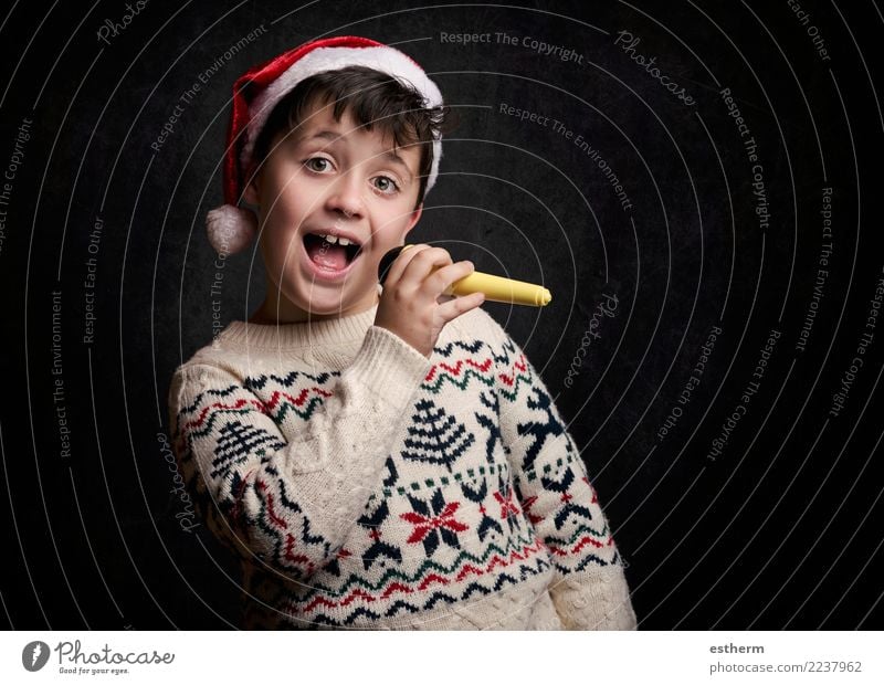 child singing Christmas carol at Christmas Lifestyle Joy Entertainment Party Event Feasts & Celebrations Christmas & Advent New Year's Eve Human being Masculine