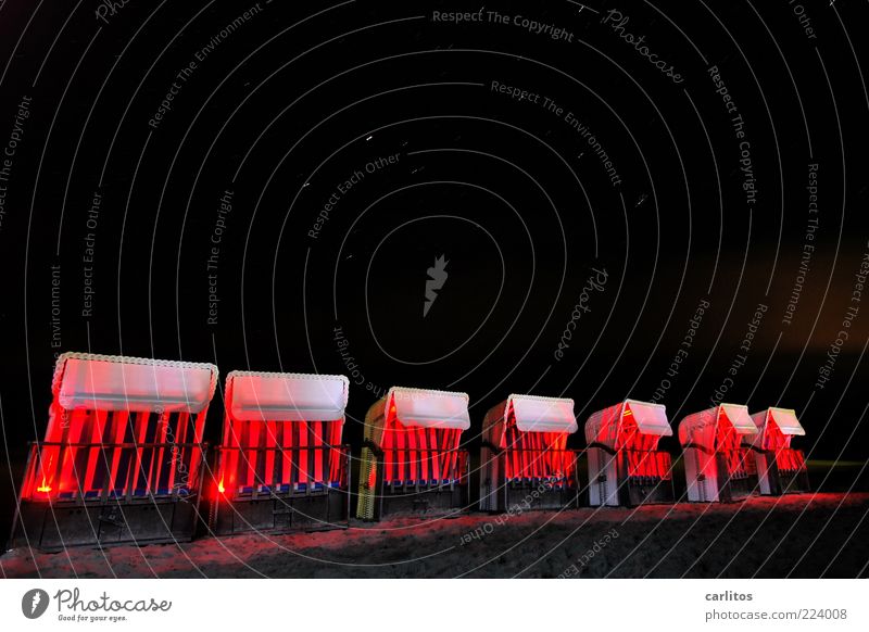 At photocase you sit in the first row ... Sand Night sky Stars Beach Illuminate Esthetic Exceptional Dark Red Black Beach chair Lighting Visual spectacle Stripe