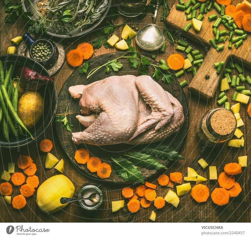 Whole chicken with cooking ingredients Food Meat Vegetable Soup Stew Herbs and spices Nutrition Lunch Dinner Banquet Organic produce Slow food Crockery Design