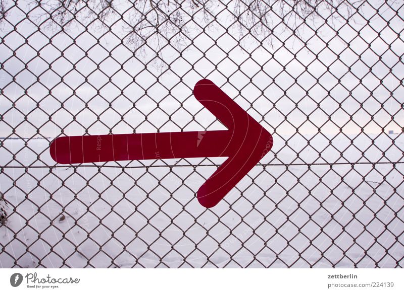 Right Sign Signs and labeling Arrow Orderliness Direction Orientation Fence Wire netting Border Boundary Boundary line Colour photo Exterior shot Day Deserted