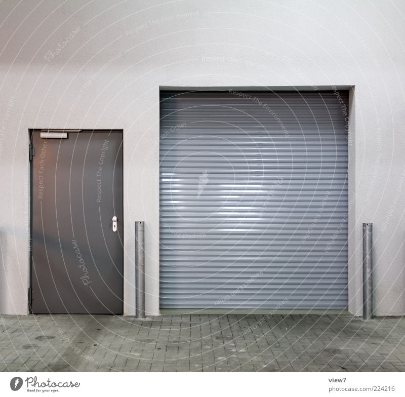 grey in grey in mouse grey Logistics Manmade structures Wall (barrier) Wall (building) Facade Door Metal Esthetic Authentic Simple Modern Original Gray Design