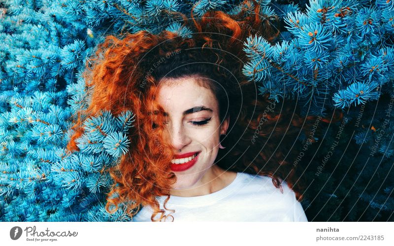 Young redhead woman and a blue tree Lifestyle Exotic Joy Beautiful Human being Feminine Young woman Youth (Young adults) 1 18 - 30 years Adults Environment