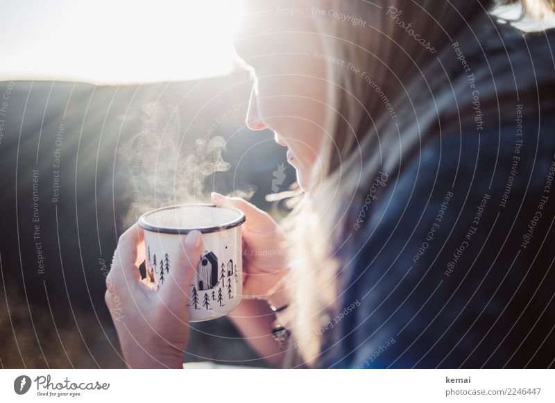Young woman with steaming cup Hot drink Tea Mug Enamel Life Harmonious Well-being Contentment Senses Relaxation Calm Leisure and hobbies Trip Adventure Freedom