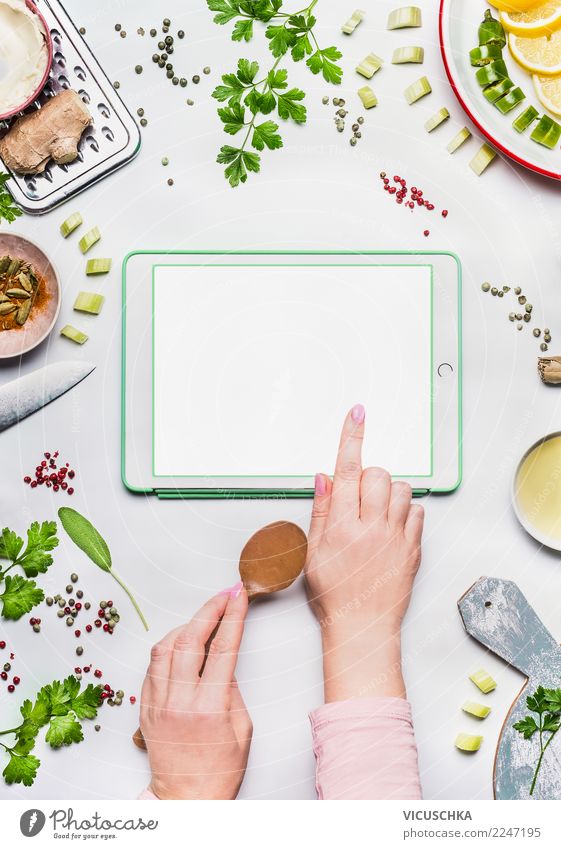 Female hands with Tablet PC on the kitchen table Food Nutrition Organic produce Vegetarian diet Diet Crockery Style Design Healthy Healthy Eating Kitchen