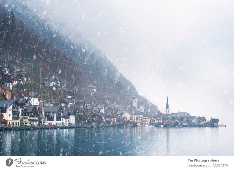 Austrian mountain town under snowfall Vacation & Travel Mountain House (Residential Structure) New Year's Eve Weather Snowfall Alps Lake Church Building Freeze