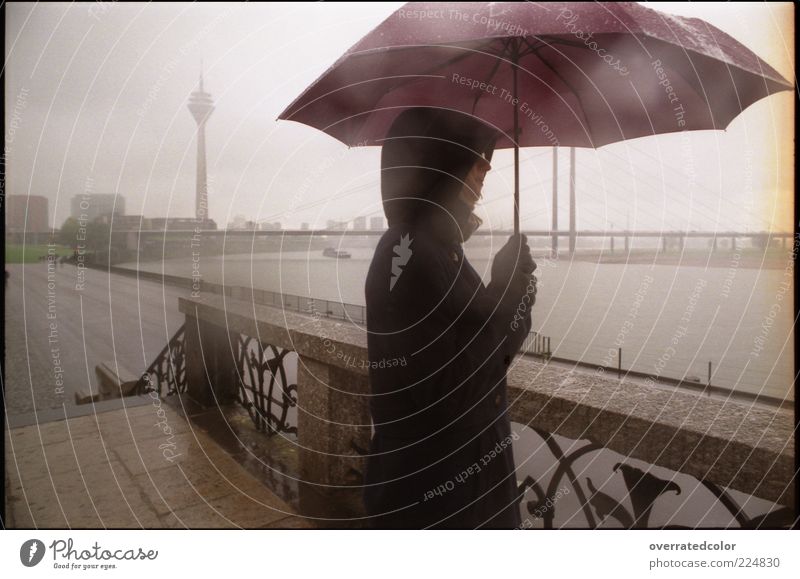 Umbrella rain Calm Far-off places Freedom Human being 1 Bad weather Storm Fog Rain Duesseldorf Deserted Bridge Tower Television tower Jacket Hooded (clothing)