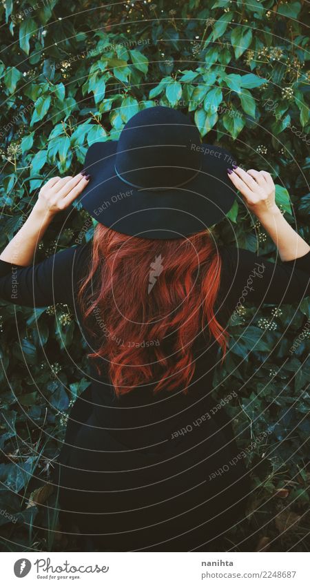 Back view of a redhead woman with a black hat Elegant Style Human being Feminine Woman Adults 1 18 - 30 years Youth (Young adults) Nature Plant Leaf
