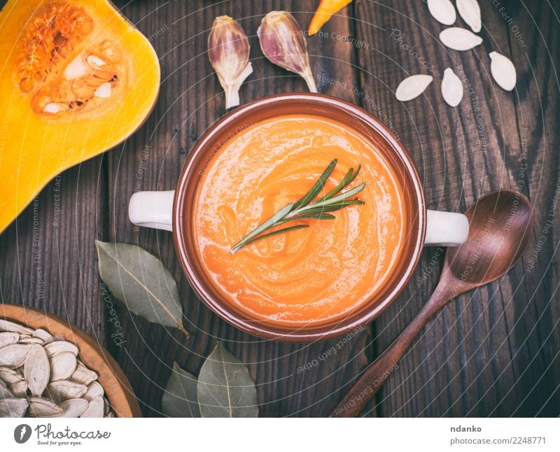 resh pumpkin soup Vegetable Soup Stew Herbs and spices Eating Lunch Dinner Vegetarian diet Bowl Spoon Decoration Table Hallowe'en Nature Autumn Wood Fresh Hot