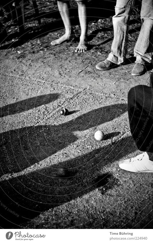 shadow play Human being Legs Feet 3 Earth Sunlight Sand Sphere Playing Stand Simple Natural Black White Gravel Black & white photo Exterior shot Copy Space left