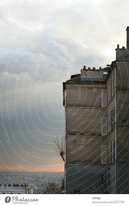 Paris Capital city Outskirts Building Wall (barrier) Wall (building) Facade Window Exceptional Threat Dark Town Vantage point Surrealism Clouds Weather