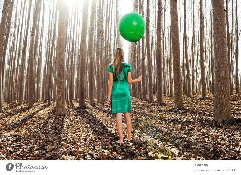 Beautiful blonde girl, dressed in green, standing in the forest Lifestyle Joy Relaxation Human being Feminine Young woman Youth (Young adults) Woman Adults 1