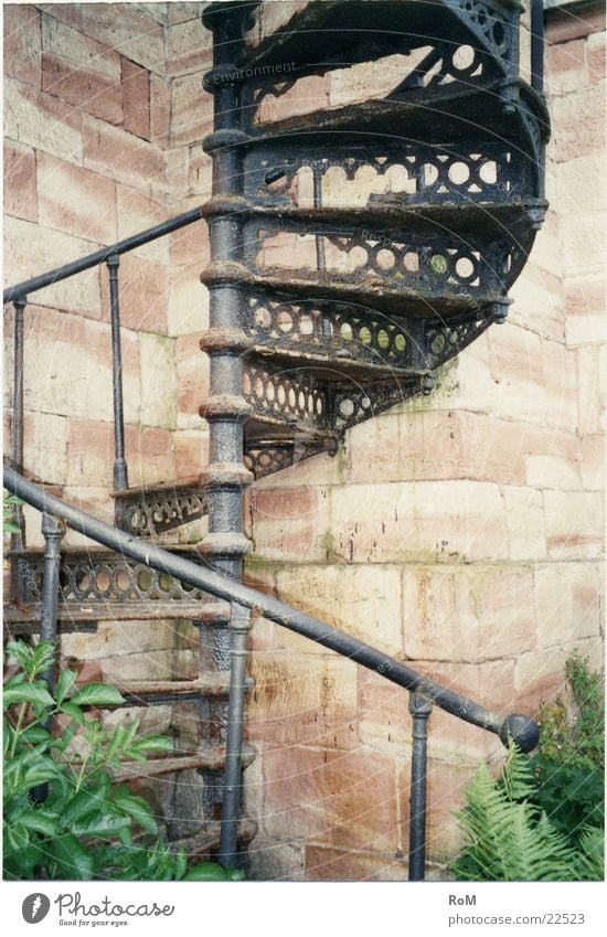 spiral path Winding staircase Decline Cast iron Historic Stairs Graffiti Handrail metal trade Rust Architecture