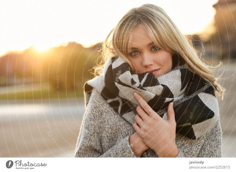 Young blonde woman in urban background at Sunset Beautiful Hair and hairstyles Face Winter Human being Feminine Young woman Youth (Young adults) Woman Adults 1