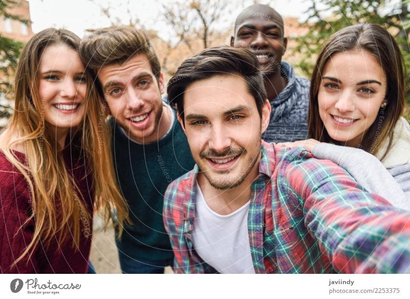 Multiracial group of friends taking selfie together Lifestyle Joy Happy Academic studies Human being Woman Adults Man Friendship Youth (Young adults) 5 Group