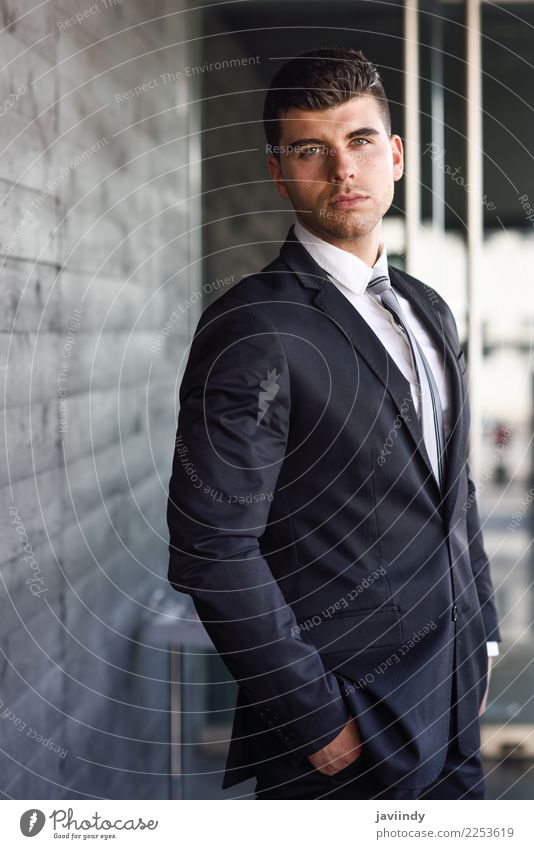 Young businessman near a modern office building Beautiful Hair and hairstyles Profession Office Business Human being Masculine Young man Youth (Young adults)