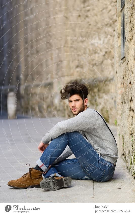 Young man sitting on the floor in urban background Lifestyle Style Hair and hairstyles Summer Human being Masculine Youth (Young adults) Man Adults 1