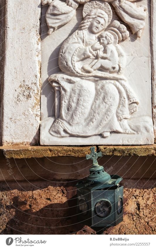 Madonna relief with child. Why is her look so sullen, the viewer wonders... Italy Relief believe Exterior shot Art God devout Religion and faith Christianity