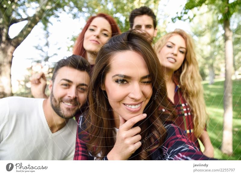 Group of friends taking selfie in urban background Lifestyle Joy Happy Beautiful Leisure and hobbies Telephone PDA Camera Human being Masculine Feminine