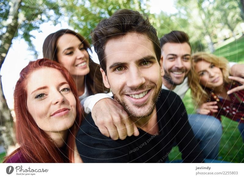 Group of friends taking selfie in urban background. Lifestyle Joy Happy Beautiful Leisure and hobbies Telephone PDA Camera Human being Masculine Feminine