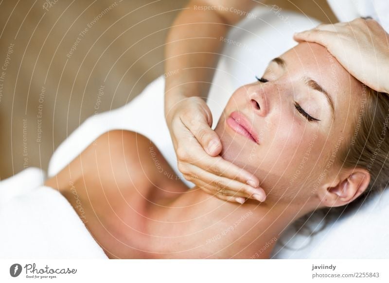 Woman receiving a head massage in a spa center Lifestyle Happy Beautiful Skin Face Health care Medical treatment Wellness Relaxation Spa Massage Human being