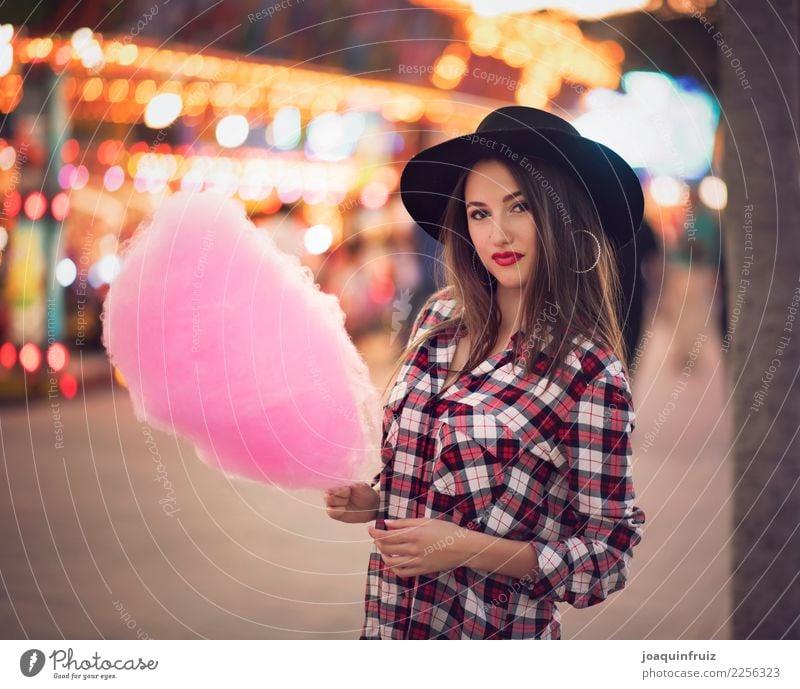 beauty girl with a cotton candy in a fair Lifestyle Joy Happy Beautiful Entertainment Woman Adults Park Hat Happiness White Carousel Amusement Park carnival