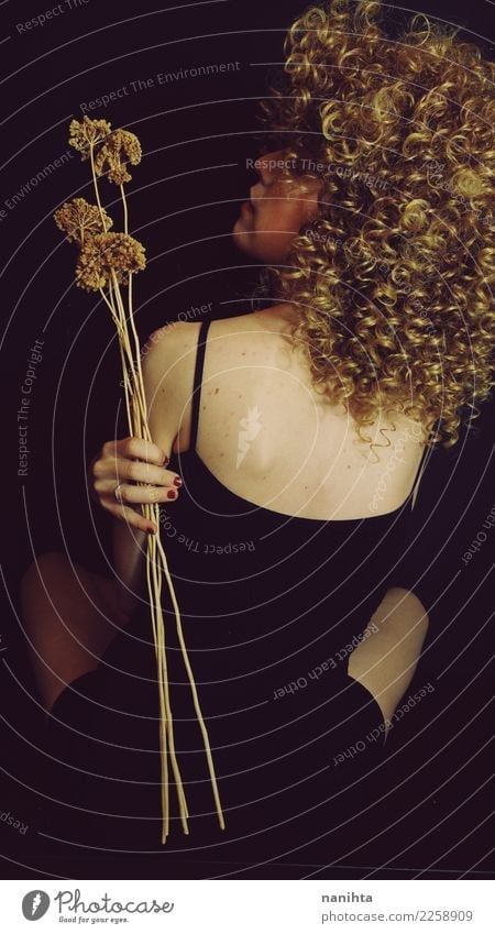 Studio portrait. Back view of a thin blonde woman Elegant Style Design Beautiful Body Hair and hairstyles Skin Harmonious Senses Relaxation Calm Human being