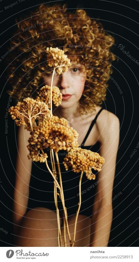 Artistic portrait of a young woman behind golden flowers Elegant Style Body Hair and hairstyles Skin Human being Feminine Young woman Youth (Young adults) 1