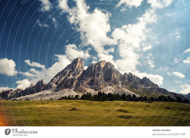 A mountain. Meadow Rock Alps Mountain Peak Might Brave Wild Dolomites Mountain range Wall of rock north face Peitlerkofel Brutal Aggression Sublime Colour photo