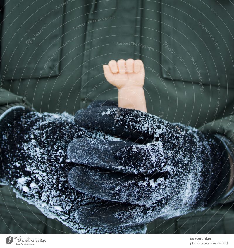 a little hand Winter Ice Frost Snow Gloves Whimsical Hand Cold Stop Find Doll Surrealism Crazy Colour photo Exterior shot Copy Space top Stick Parka Detail