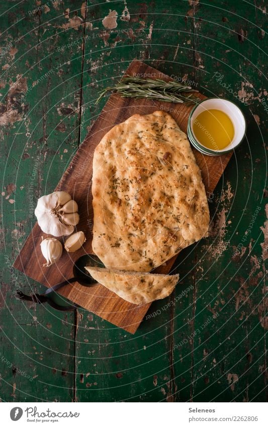 garlic bread Food Grain Dough Baked goods Bread Herbs and spices Cooking oil Garlic Rosemary Eating Lunch Dinner Organic produce Vegetarian diet Fresh Healthy