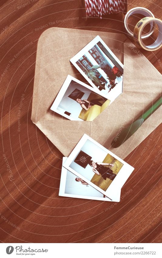 Instant pictures and envelope on table (01) Lifestyle Feminine Young woman Youth (Young adults) Woman Adults Human being 18 - 30 years Communicate