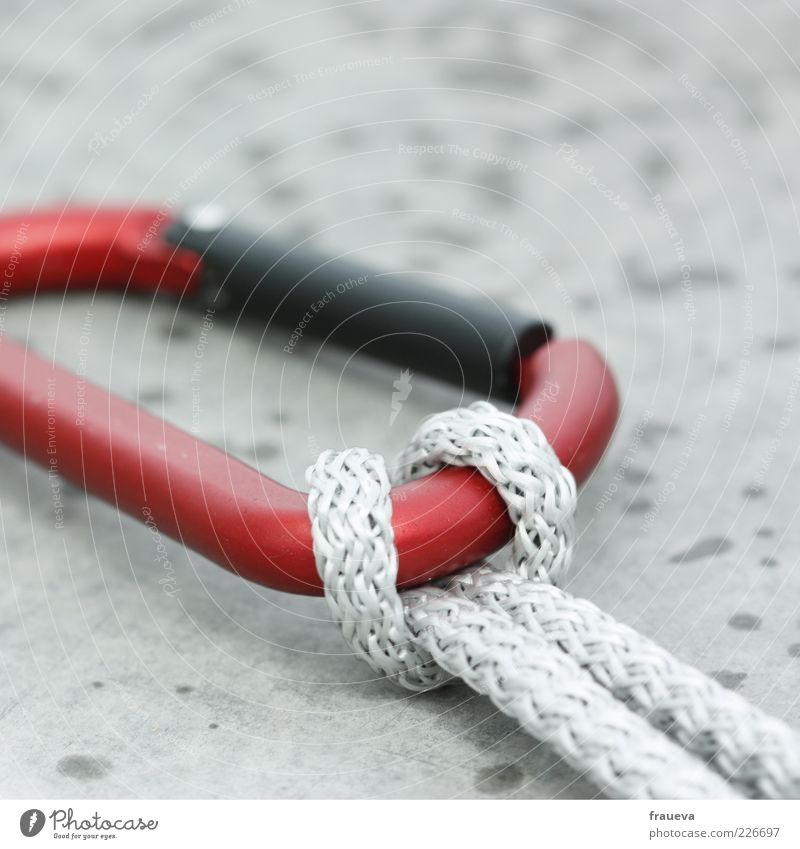 safeguard Metal Gray Red White Risk carbine Rope Collateralization Colour photo Exterior shot Close-up Detail Macro (Extreme close-up) Deserted