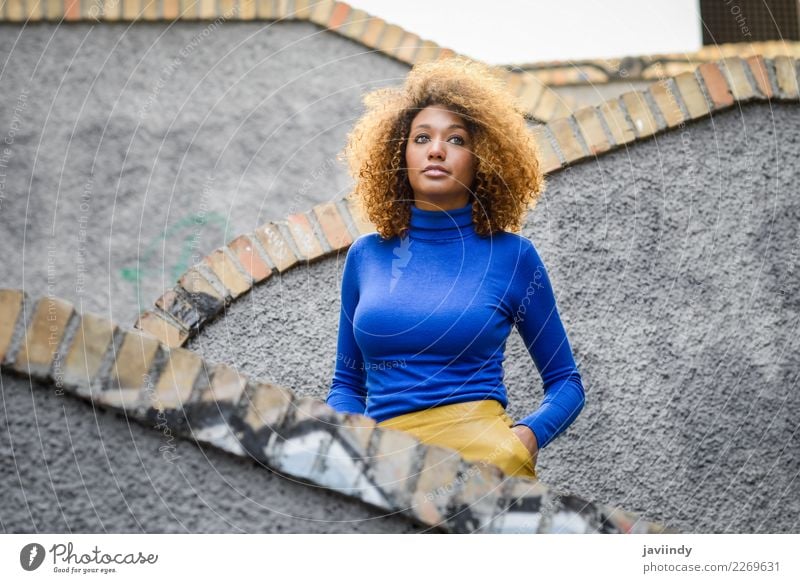 Young woman with afro hairstyle in urban street Lifestyle Elegant Style Beautiful Hair and hairstyles Face Human being Feminine Youth (Young adults) Woman