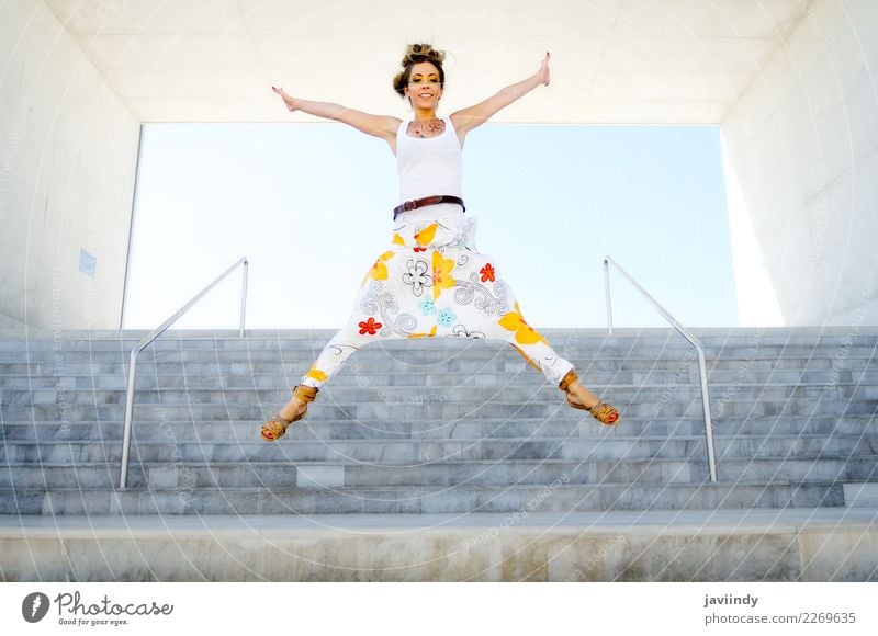 Young funny woman jumping in urban steps Lifestyle Style Human being Feminine Young woman Youth (Young adults) Woman Adults 1 18 - 30 years Fashion Clothing