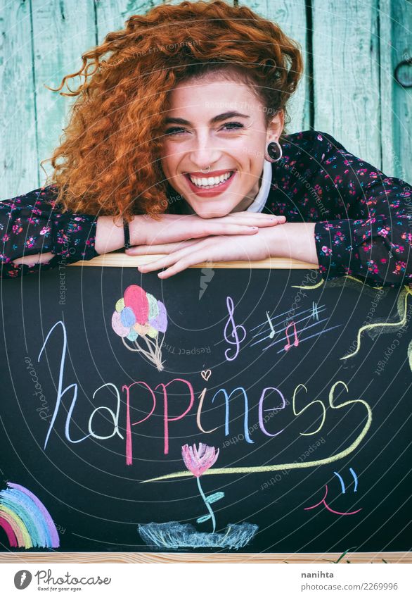 Young happy redhead woman with a blackboard Lifestyle Style Joy Beautiful Hair and hairstyles Skin Face Blackboard Human being Feminine Young woman