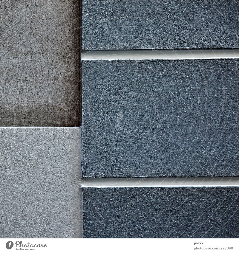 - | = Wall (barrier) Wall (building) Facade Sharp-edged Blue Gray Plaster Line Colour photo Subdued colour Exterior shot Detail Day Seam Deserted Copy Space