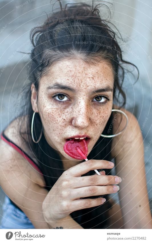 Teenage girl with freckles eating an lollipop Lollipop Lifestyle Exotic Joy Beautiful Skin Healthy Health care Wellness Summer Valentine's Day Human being