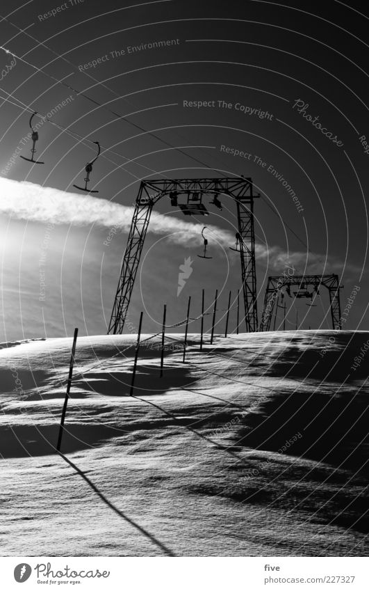tug Nature Sky Clouds Winter Weather Beautiful weather Ice Frost Snow Hill Alps Mountain Cold Ski tow Ski lift Pole Black & white photo Exterior shot Morning