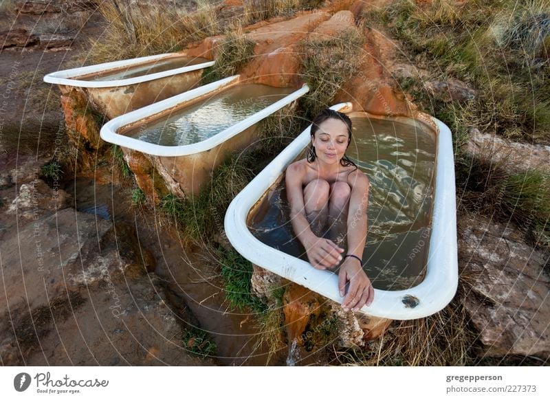 Young woman relaxing in a natural hot springs.. Beautiful Well-being Relaxation Spa Swimming & Bathing Bathtub Youth (Young adults) 1 Human being 18 - 30 years