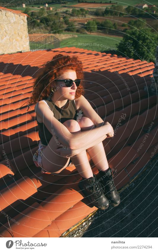 Young redhead woman sitting in a roof Lifestyle Style Hair and hairstyles Wellness Well-being Senses Relaxation Vacation & Travel Tourism Trip Adventure Freedom