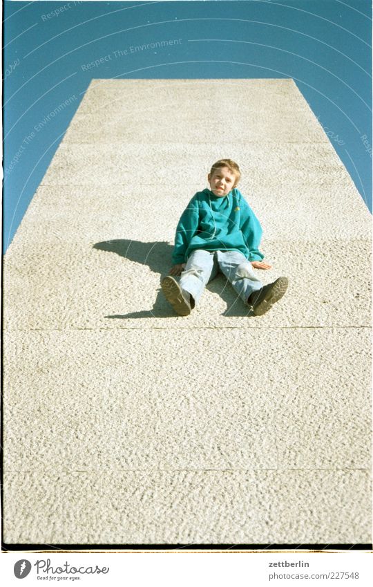 tom Trip Summer Masculine Boy (child) 8 - 13 years Child Infancy Sit Cool (slang) Funny Blue Green Joy Optimism Concrete Ramp Colour photo Exterior shot