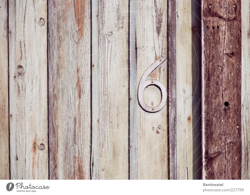 six Wood Digits and numbers Brown 6 Wood grain Joist Wooden wall House number Colour photo Exterior shot Copy Space left Shadow Deserted