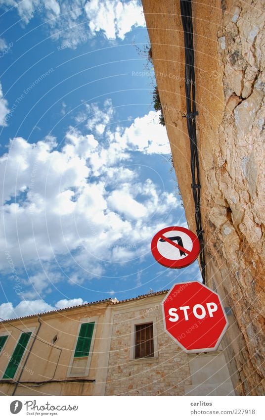 Who brakes, is cowardly Clouds House (Residential Structure) Road sign Old Orderliness Majorca Shutter Natural stone Quarrystone facade Blue Green Red Turn off