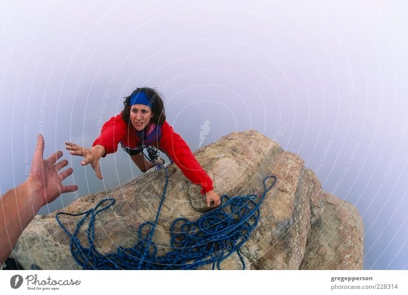 Climber reaching for a helping-hand. Adventure Climbing Mountaineering Rope Hand 1 Human being 18 - 30 years Youth (Young adults) Adults Peak Athletic Tall