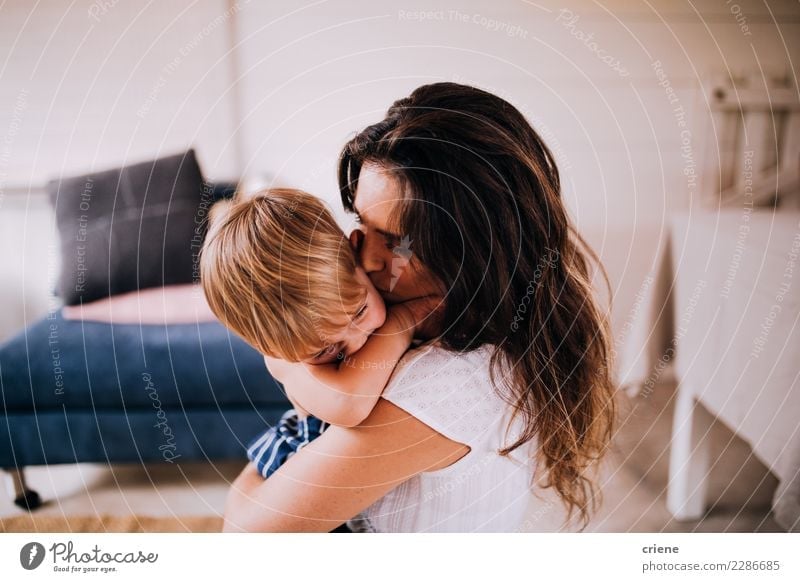 Mother and Son cuddling at home Happy Child Human being Toddler Boy (child) Adults Family & Relations Infancy Kissing Love Together Cute Emotions Relationship