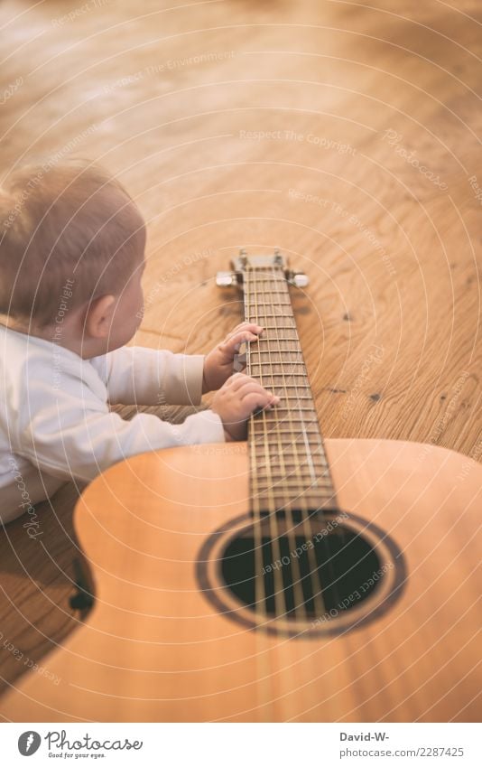 you can't start early enough Parenting Education Child Study Human being Masculine Feminine Baby Toddler Infancy Life Hand Fingers 1 Art Culture Music Guitar
