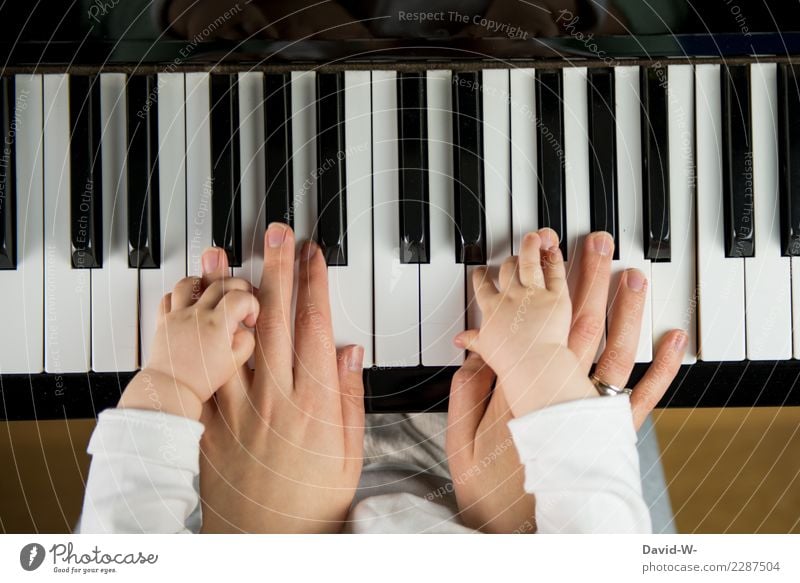 Mother and child playing the piano Family Child Parenting at the same time in common Love Responsibility upbringing Piano Music Musician Musical instrument
