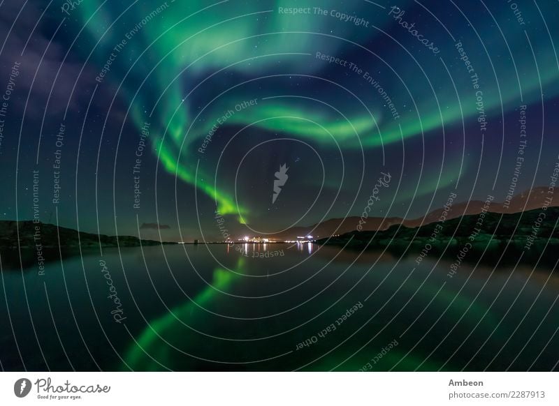 Green Northern lights reflecting in the lake Exotic Vacation & Travel Ocean Winter Mountain Environment Nature Landscape Air Sky Clouds Autumn Climate Weather